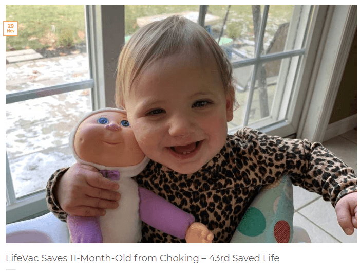 Little girl smiling and holding a doll, Caption reads: LifeVAc saves 11-month-old from Choking - 43 Saved Life