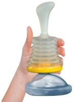 Hand holding a LifeVac suction unit against a white background