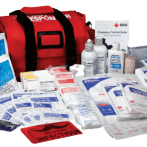 Large red bag for first responders first aid kit. The contents are layed out around the bag and include dressings, bandages, eyewash, cold compresses, and other first aid supplies.