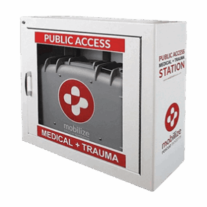 White, wall mounted cabinet with class door. Text reads, "Public Access, Medical + Trauma"